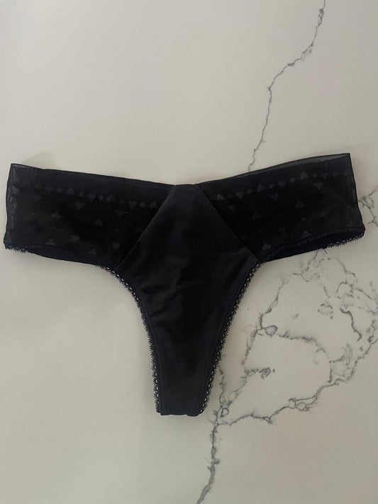 Tanga invisible de encaje transparente a los lados negra Victoria´s Secret